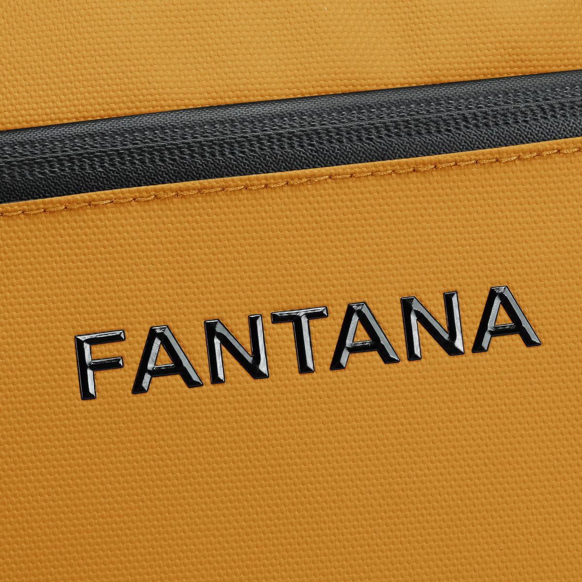 Mustard — Voyager Shoulder Bag, embossed logo, detail